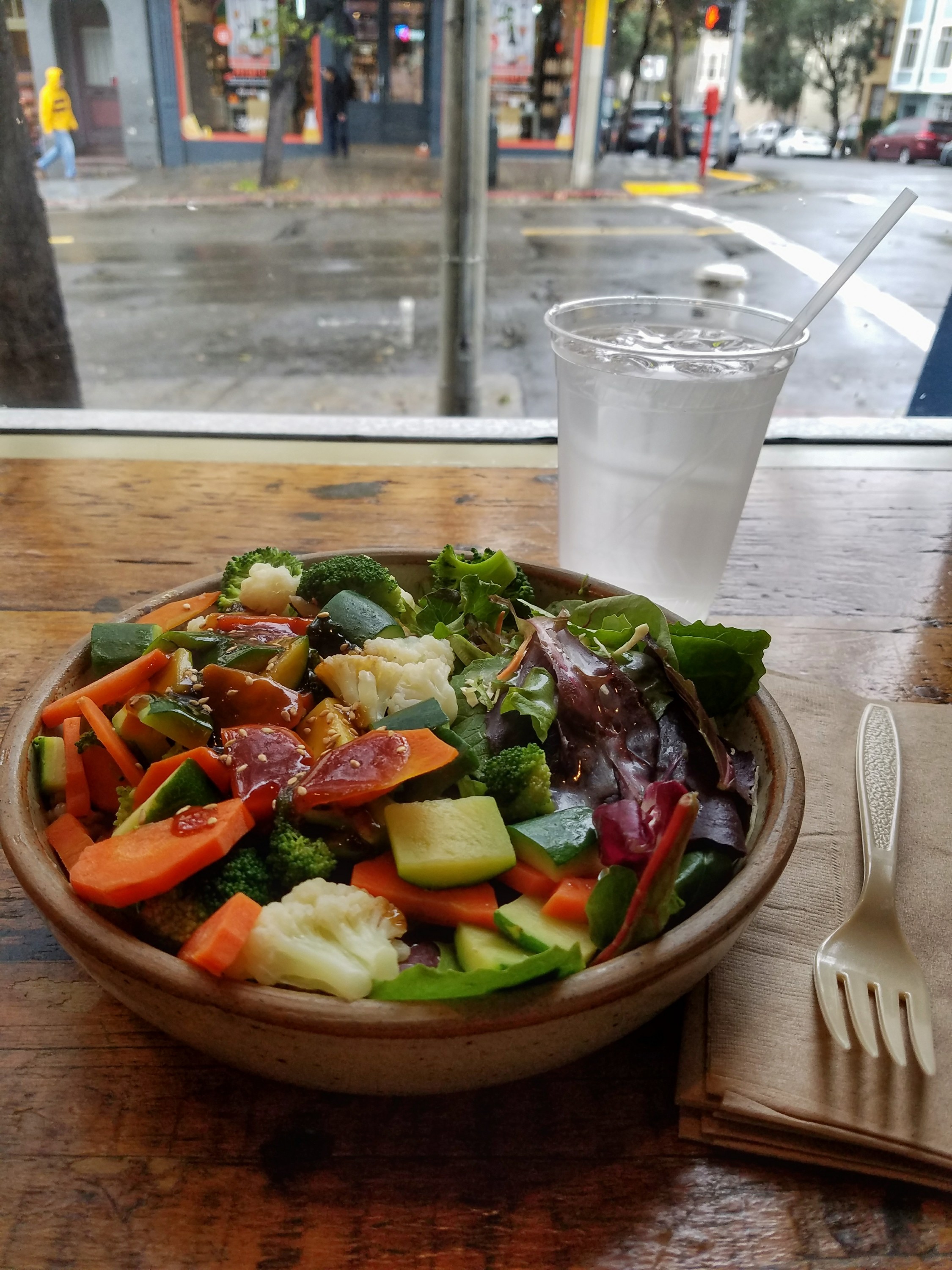 Stir fry bowl in front of a window